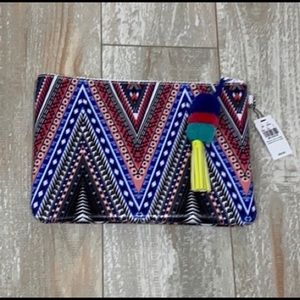 NWT pom pom tassel clutch